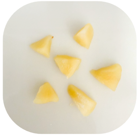 Apple snacks for babies and toddlers | Little Bellies AUS Small pineapple chunks arranged on a white plate.