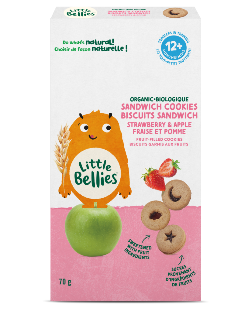 Packaging for Little Bellies organic sandwich cookies with strawberry & apple filling; shows a cute orange character, fruit graphics, and product text in green and pink on a white box.